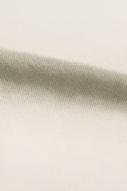 Sasuke Uchiha oversized t-shirt close up of soft cream cotton fabric texture showing fine knit for cozy fit