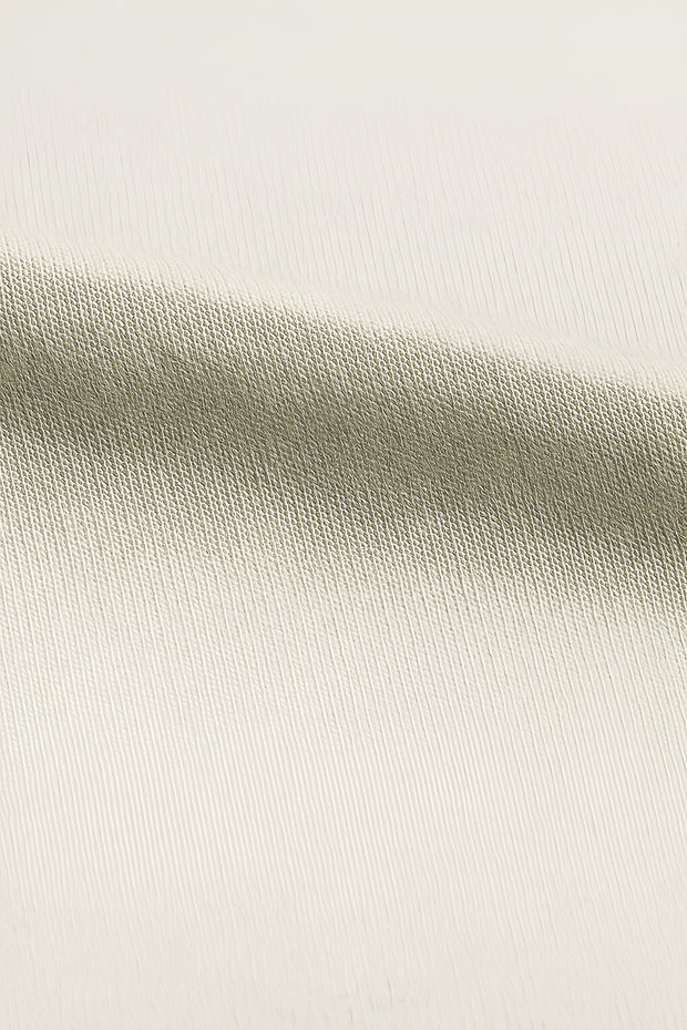 Sasuke Uchiha oversized t-shirt close up of soft cream cotton fabric texture showing fine knit for cozy fit