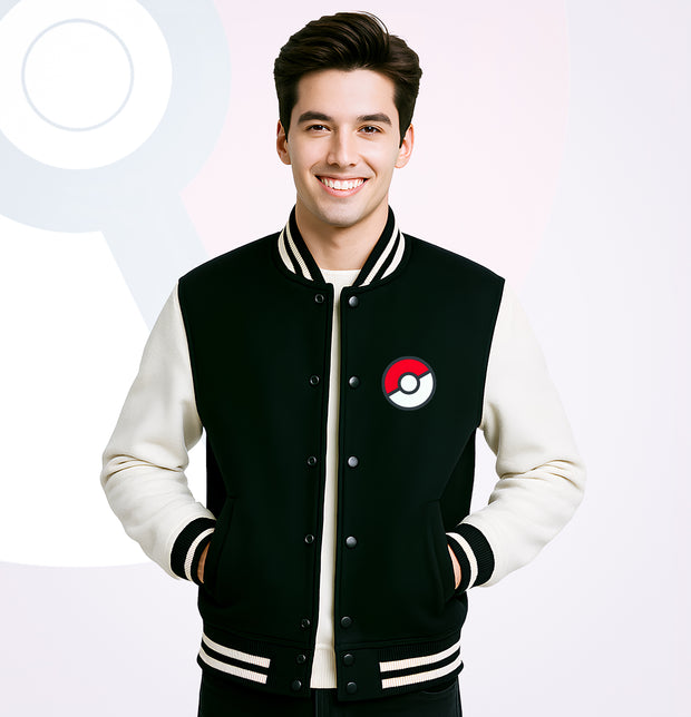 Young man wearing black and white pokemon varsity jacket with Pokeball emblem on chest