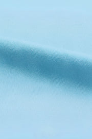 FantasyFit Superman unisex t-shirt light blue fabric close up showing soft cotton knit texture and stretch